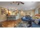 Kitchen with breakfast bar and hardwood floors at 8426 Chamberlain Pl, Oviedo, FL 32765