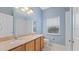 Bathroom with dual vanity and updated fixtures at 10952 Arbor View Blvd, Orlando, FL 32825