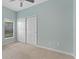 Light and airy bedroom with double-door closet at 10952 Arbor View Blvd, Orlando, FL 32825
