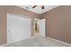 Bedroom with double door closet and access to bathroom at 10952 Arbor View Blvd, Orlando, FL 32825