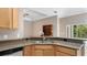 Kitchen features a large island and double sink at 10952 Arbor View Blvd, Orlando, FL 32825