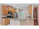 Bright kitchen with a peninsula and modern appliances at 10952 Arbor View Blvd, Orlando, FL 32825