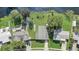 Aerial view of property, showcasing a house and surrounding lots near a canal at 1108 Evangeline Ave, Orlando, FL 32809