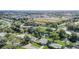 Aerial view showing home's location in a residential neighborhood near a waterway at 1108 Evangeline Ave, Orlando, FL 32809