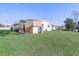 Backyard view with shed and green grass at 1108 Evangeline Ave, Orlando, FL 32809