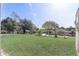Backyard with canal view and lush green grass at 1108 Evangeline Ave, Orlando, FL 32809