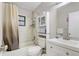 Clean bathroom with white vanity and shower/tub combo at 1108 Evangeline Ave, Orlando, FL 32809