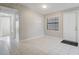 Simple dining area with tile floor and access to exterior at 1108 Evangeline Ave, Orlando, FL 32809
