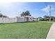 Charming gray house with white fence and yard at 1108 Evangeline Ave, Orlando, FL 32809