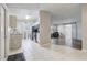 Open kitchen features modern appliances and a view into the living room at 1108 Evangeline Ave, Orlando, FL 32809