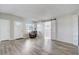 Living room with vinyl flooring and barn door at 1108 Evangeline Ave, Orlando, FL 32809