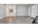 Open living area with vinyl flooring and door at 1108 Evangeline Ave, Orlando, FL 32809