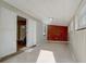 Sunroom with brick accent wall and sliding glass doors at 1108 Evangeline Ave, Orlando, FL 32809