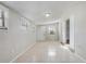 Bright sunroom with tile floors and access to exterior at 1108 Evangeline Ave, Orlando, FL 32809
