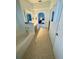 Bathroom with soaking tub, double vanity, and view into bedroom at 1208 Honey Rd, Apopka, FL 32712