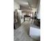 Modern kitchen with stainless steel appliances and granite countertops at 1208 Honey Rd, Apopka, FL 32712