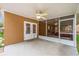 Screened patio with a hot tub and access to the backyard at 1208 Honey Rd, Apopka, FL 32712