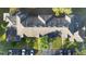 Aerial view of a building with a gray roof and surrounding parking lot at 13312 Summerton Dr, Orlando, FL 32824