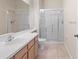 Updated bathroom with a large shower and tile floors at 13312 Summerton Dr, Orlando, FL 32824