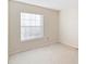 Bright bedroom with neutral walls and carpet at 13312 Summerton Dr, Orlando, FL 32824