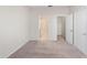 Simple bedroom featuring carpet floors and a walk-in closet at 13312 Summerton Dr, Orlando, FL 32824