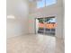 Bright dining room with high ceilings and sliding doors at 13312 Summerton Dr, Orlando, FL 32824