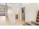 Hallway with half bathroom and stairs at 13312 Summerton Dr, Orlando, FL 32824