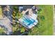 Community pool and surrounding landscape at 13312 Summerton Dr, Orlando, FL 32824