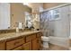 Clean bathroom with granite vanity, shower/tub combo, and updated fixtures at 13607 Zori Ln, Windermere, FL 34786