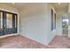 Inviting front entry with a modern door and brick walkway at 13607 Zori Ln, Windermere, FL 34786