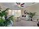 Comfortable living room featuring a neutral color palette and ample natural light at 13607 Zori Ln, Windermere, FL 34786