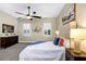 Spacious primary bedroom with a cozy atmosphere and plenty of natural light at 13607 Zori Ln, Windermere, FL 34786