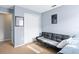 Guest bedroom with a black futon and large closet at 142 Santana Pl, Davenport, FL 33897