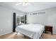 Bedroom with a queen-size bed and patio access at 142 Santana Pl, Davenport, FL 33897