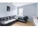 Bedroom with a sofa bed and a window offering natural light at 142 Santana Pl, Davenport, FL 33897