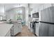 Clean, updated kitchen with stainless steel appliances at 142 Santana Pl, Davenport, FL 33897