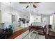 Open concept living area with kitchen and dining room visible at 142 Santana Pl, Davenport, FL 33897
