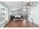 Spacious living room with hardwood floors and ceiling fan at 142 Santana Pl, Davenport, FL 33897