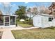 Spacious backyard with shed and screened porch at 1429 Royal Palm Dr, Edgewater, FL 32132