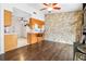 Kitchen features light wood cabinets, a breakfast bar, and a view into the dining area at 1429 Royal Palm Dr, Edgewater, FL 32132