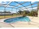 Enjoy this refreshing screened pool and patio at 1429 Royal Palm Dr, Edgewater, FL 32132