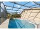 Relaxing screened-in pool perfect for summer at 1429 Royal Palm Dr, Edgewater, FL 32132