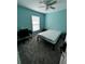Bedroom with double bed, desk, and window at 1526 Providence Rd, Lakeland, FL 33805