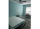 Bedroom with a double bed, nightstand, and workspace at 1526 Providence Rd, Lakeland, FL 33805