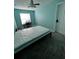 Bedroom with double bed, workspace and ceiling fan at 1526 Providence Rd, Lakeland, FL 33805
