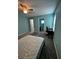 Bedroom with a double bed, desk, and en-suite bathroom at 1526 Providence Rd, Lakeland, FL 33805
