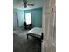 Bedroom with double bed, desk, and ceiling fan at 1526 Providence Rd, Lakeland, FL 33805