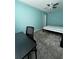 Bedroom with a desk and chair, double bed and ceiling fan at 1526 Providence Rd, Lakeland, FL 33805