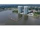 Aerial view of community with waterfront and boat slips at 241 Riverside Drive # 409, Daytona Beach, FL 32117