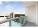 Balcony overlooking trees and a parking area at 241 Riverside Drive # 409, Daytona Beach, FL 32117